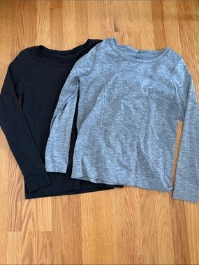 2 Lululemon Shirts (Tags removed)